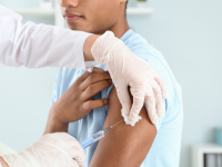  child receiving shot in the arm